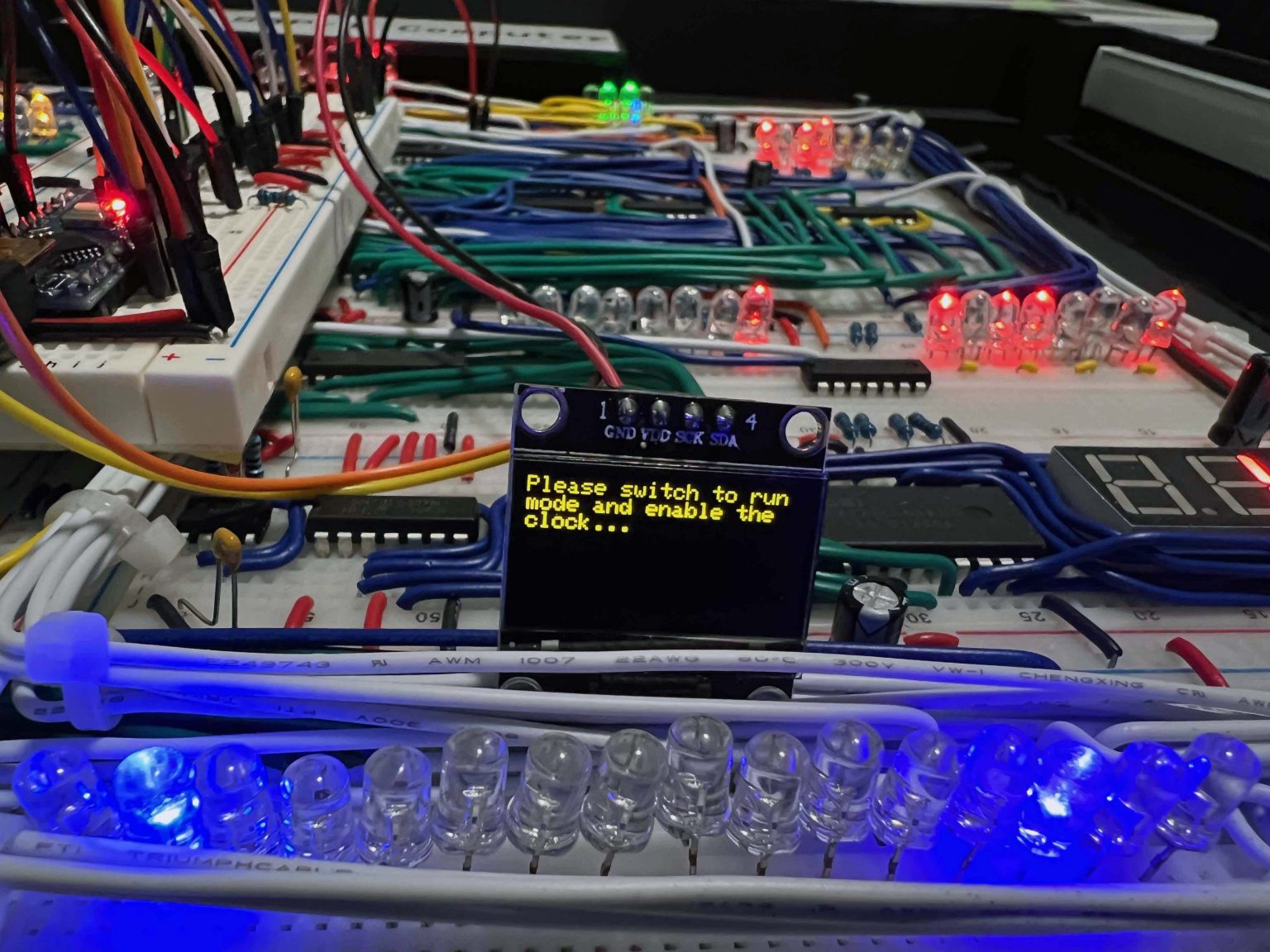 A mini OLED connected to the Arduino Nano using I2C bus.